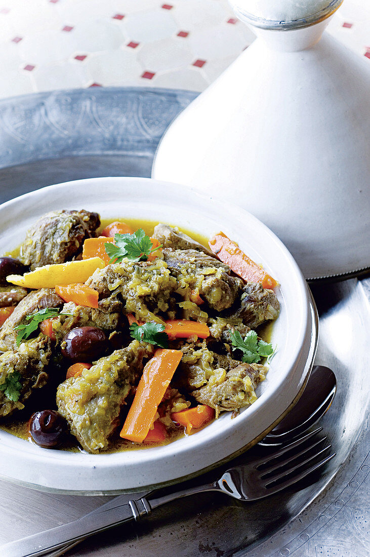 Lamb tagine with young carrots, olives and coriander