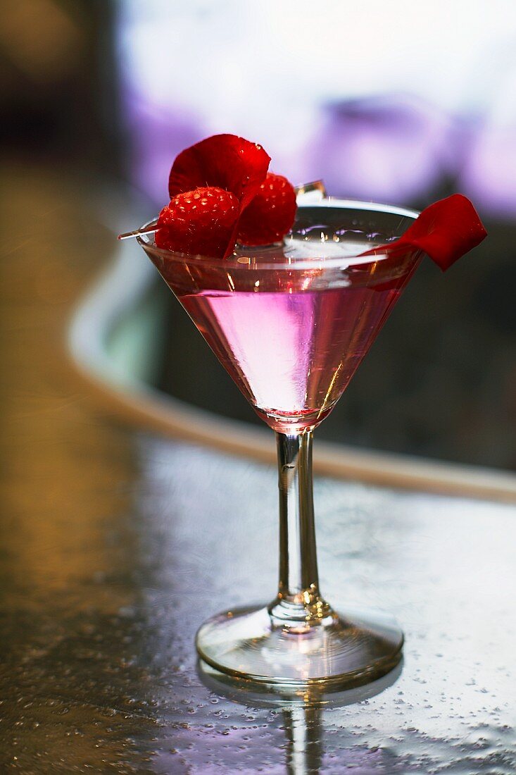 Vodka with rose liqueur and raspberries