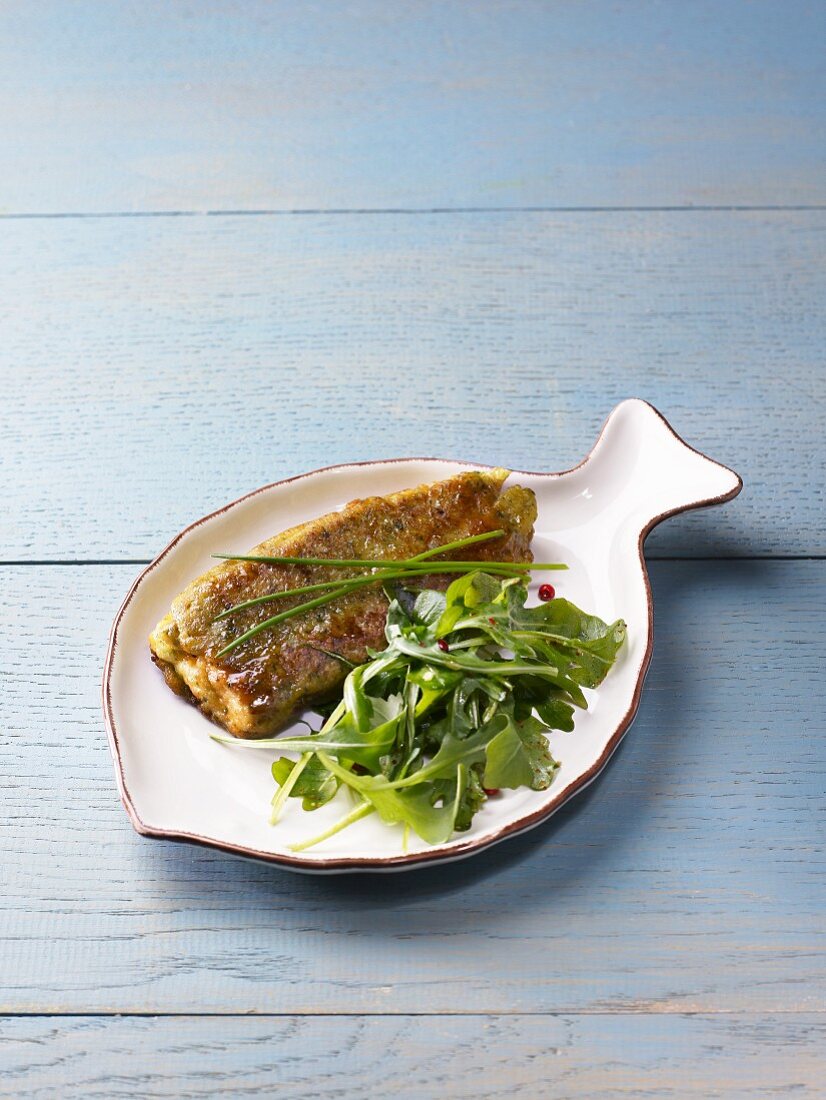 Salmon fillet with rocket salad