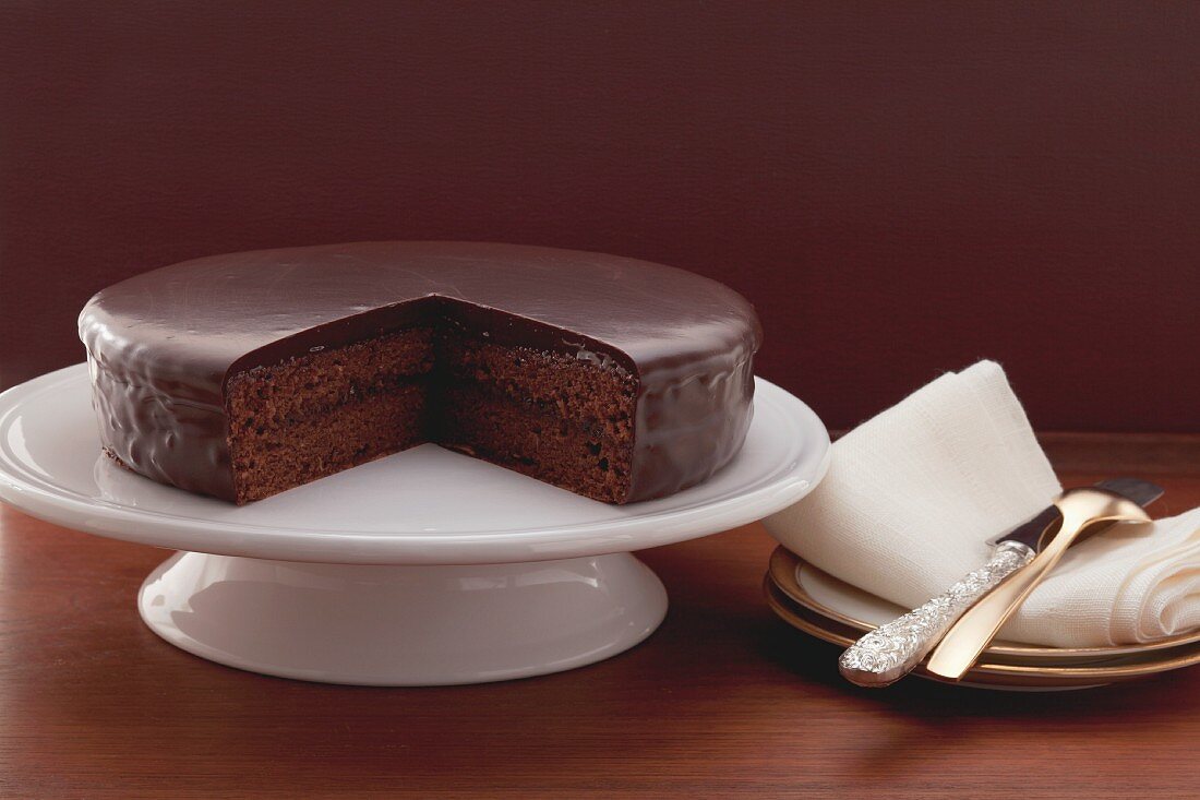 Sachertorte (chocolate cake), a piece removed