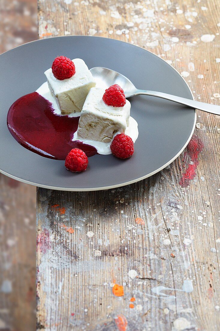 Licorice semifreddo with raspberries and fruit sauce