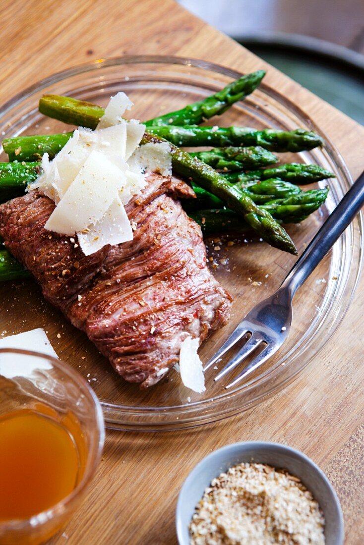 Beef steak with porcino mushrooms, asparagus and parmesan