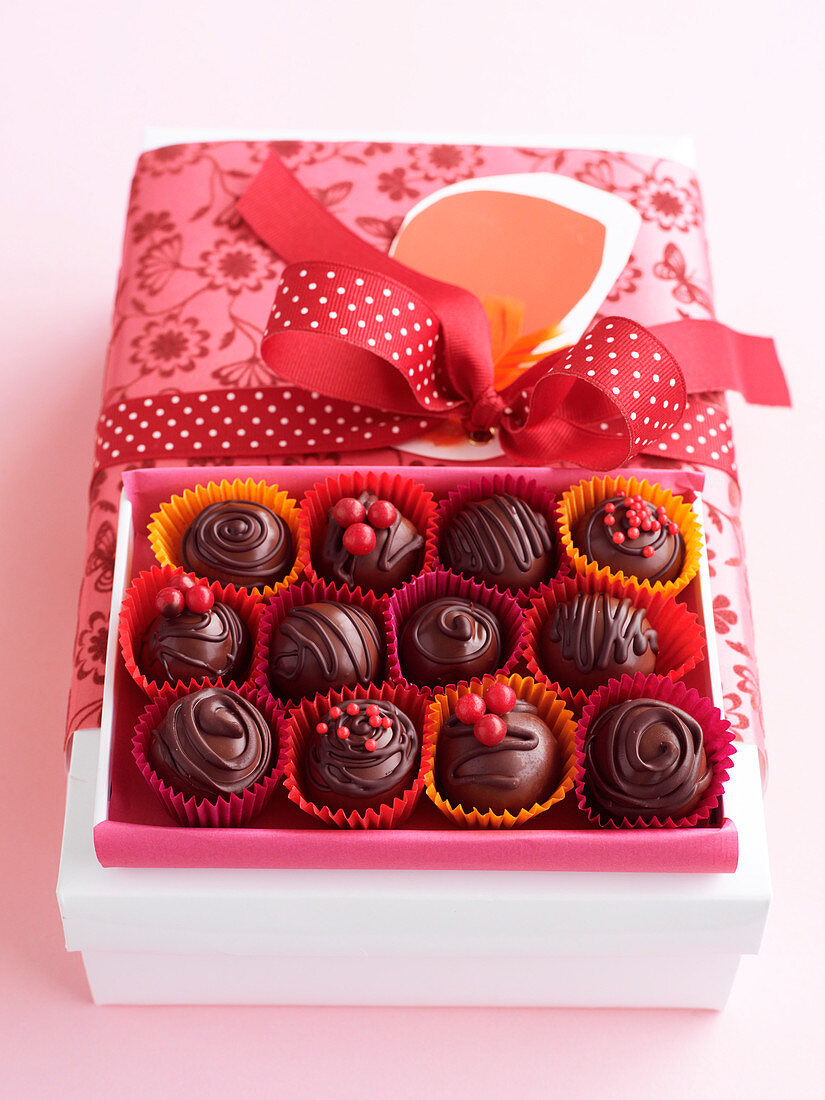 Pralines decorated with red sugar balls