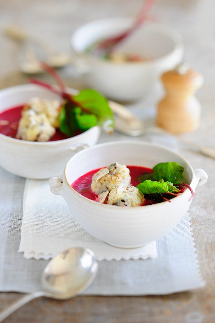 Beetroot soup with plum and polenta dumplings