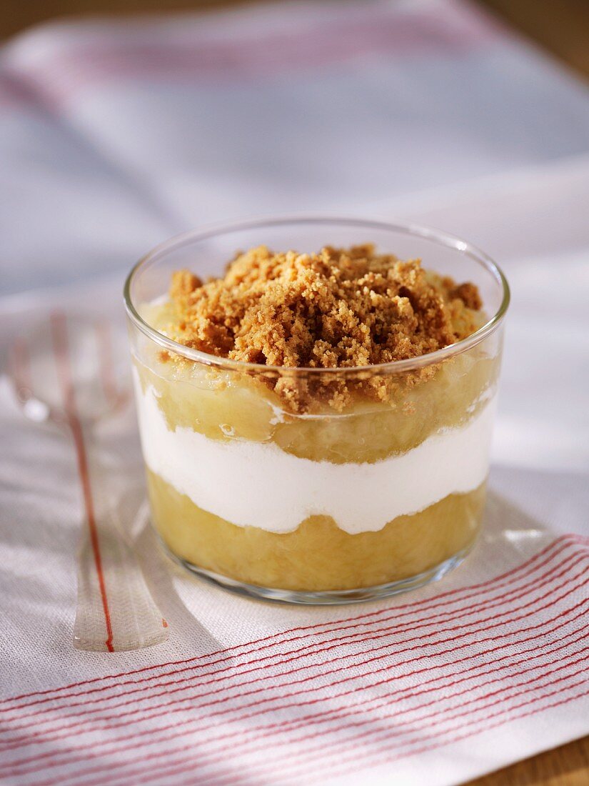 Apple compote with cream and crumbles