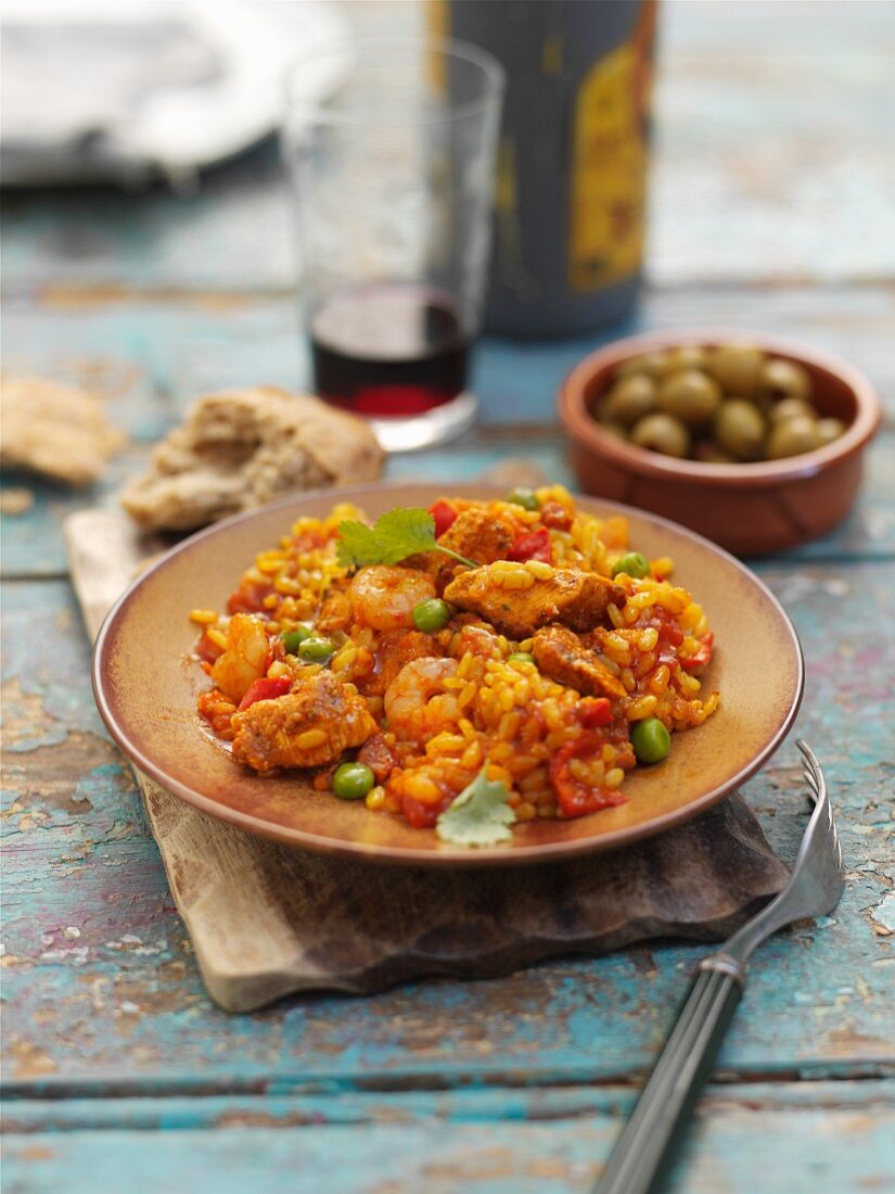 Paella with chicken and prawns