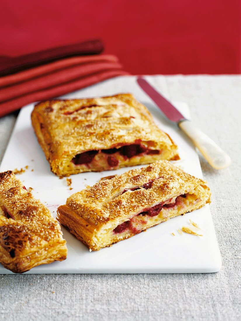 Puff pastry pockets filled with raspberries and vanilla cream