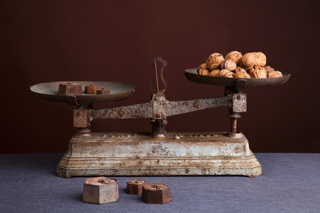 Walnuts on an old pair of kitchen scales