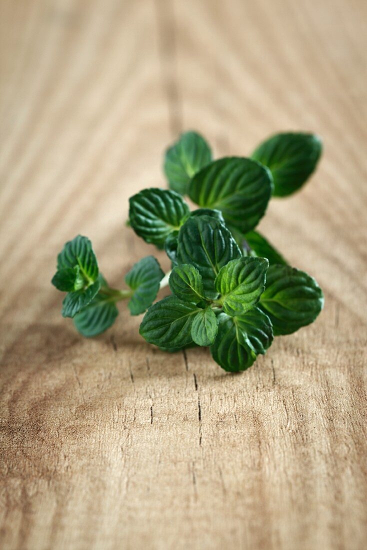 Fresh mint on a wooden surface