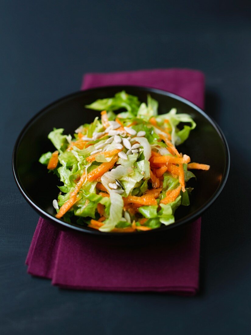 Endive and carrot salad with sunflower seeds