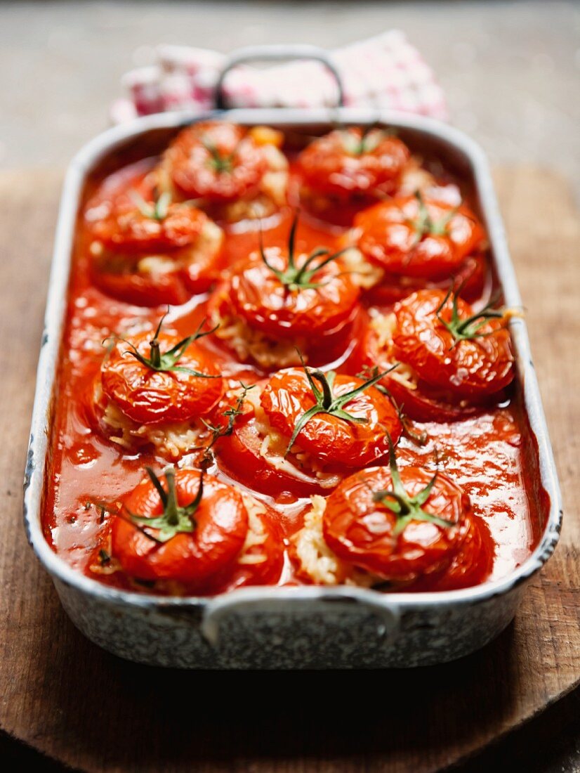 Stuffed tomatoes in a roasting dish