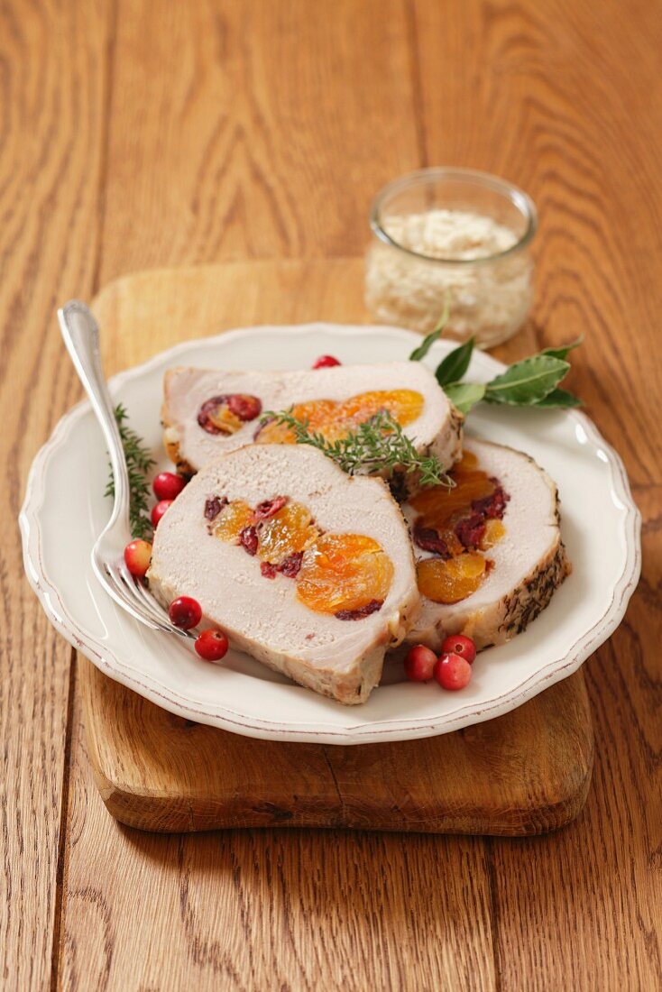 Stuffed roast pork with dried apricots and cranberries