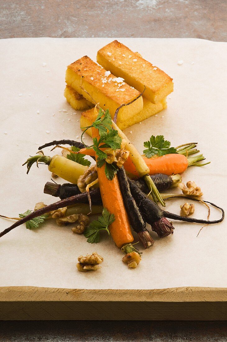 Sauteed carrots with slices of polenta