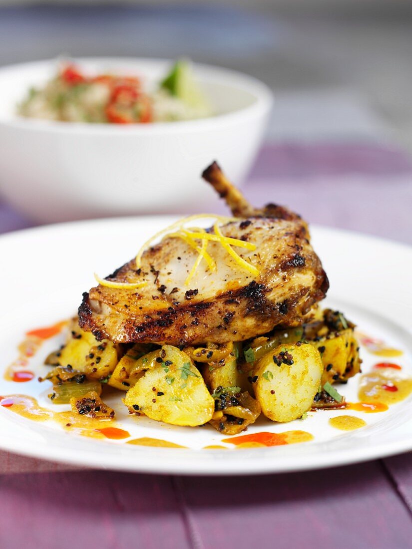 Hähnchen Nimbu auf Kartoffeln (Indien)