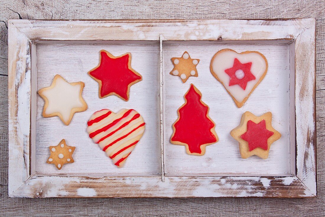 Assorted Christmas cookies in a wooden frame