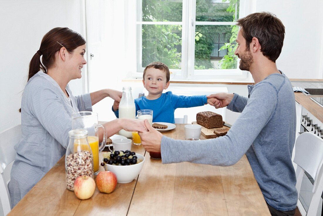 A young family having breakfast