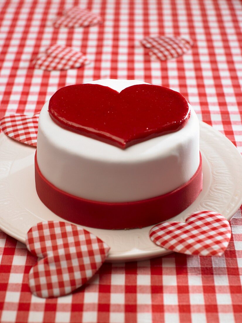 A red and white heart cake
