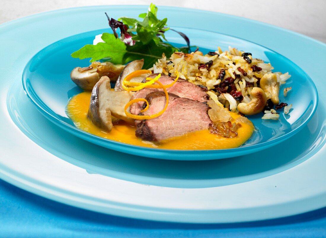 Pork loin with mushrooms and barberry rice
