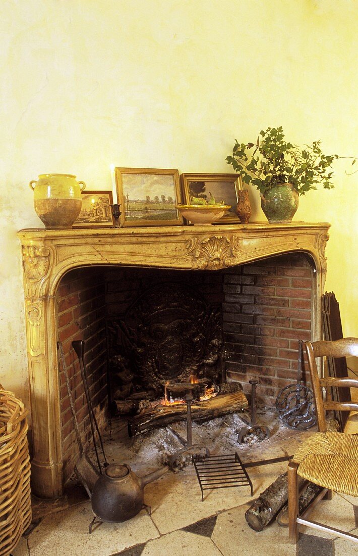 Open fireplace in the corner of a room