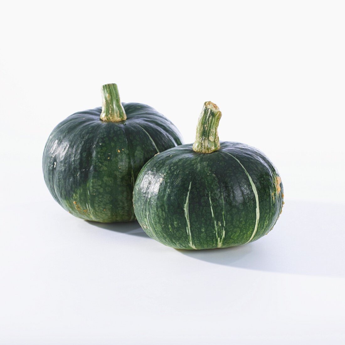 Two green pumpkins