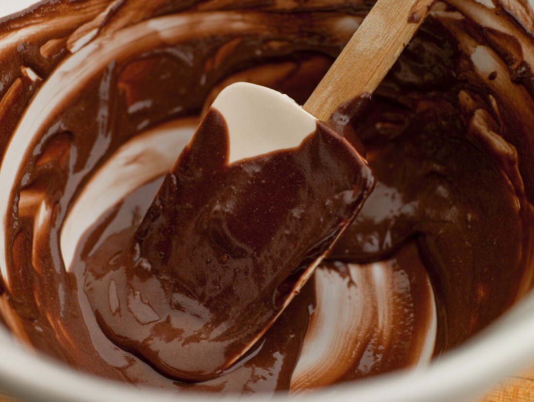 Mixing Bowl with Rubber Spatula and Chocolate Cake Batter Remains