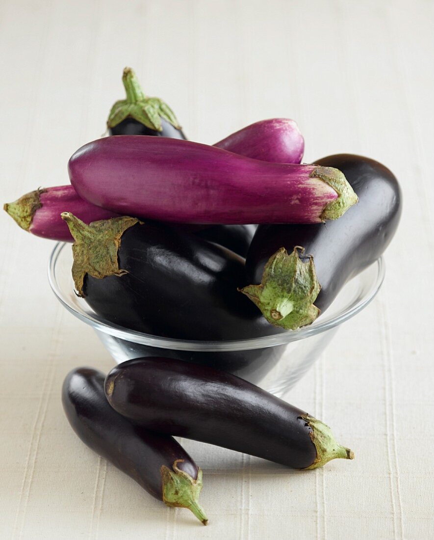 Eggplant Variety In and Beside a Bowl