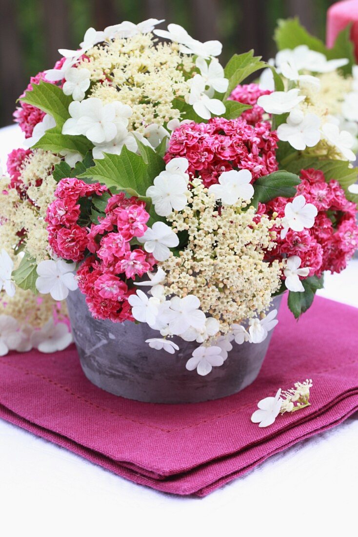 Bouquet of red hawthorn & lacecap hydrangea