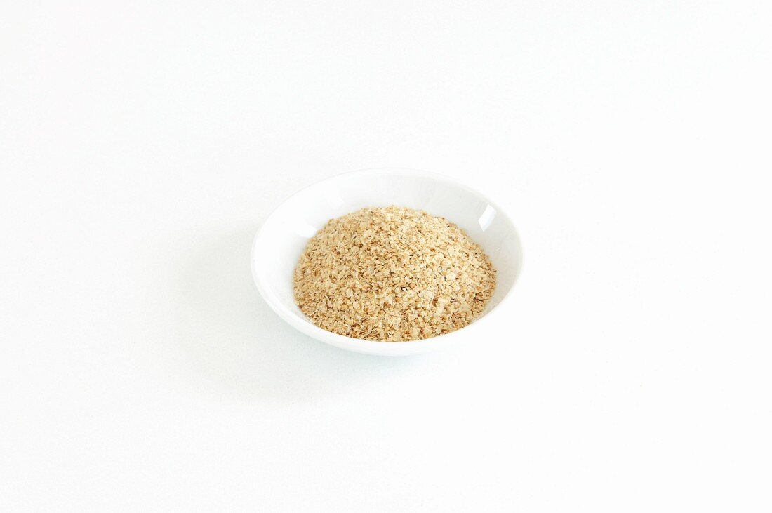 A bowl of teff flakes (gluten-free)