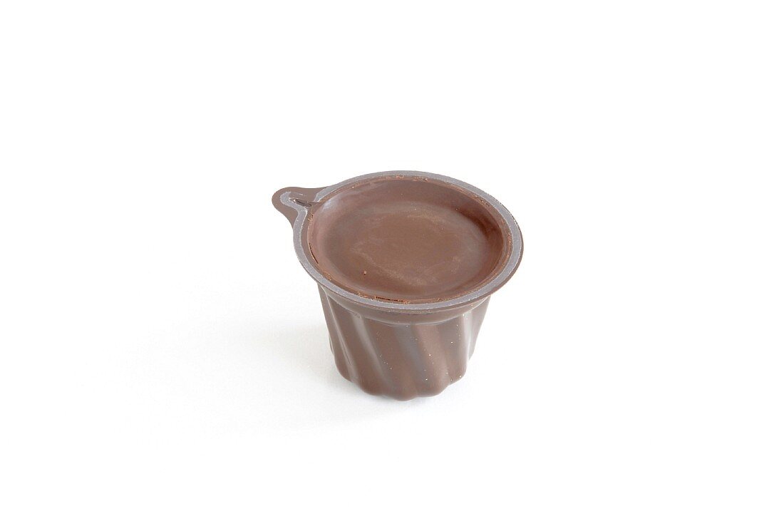 A cup of chocolate glaze