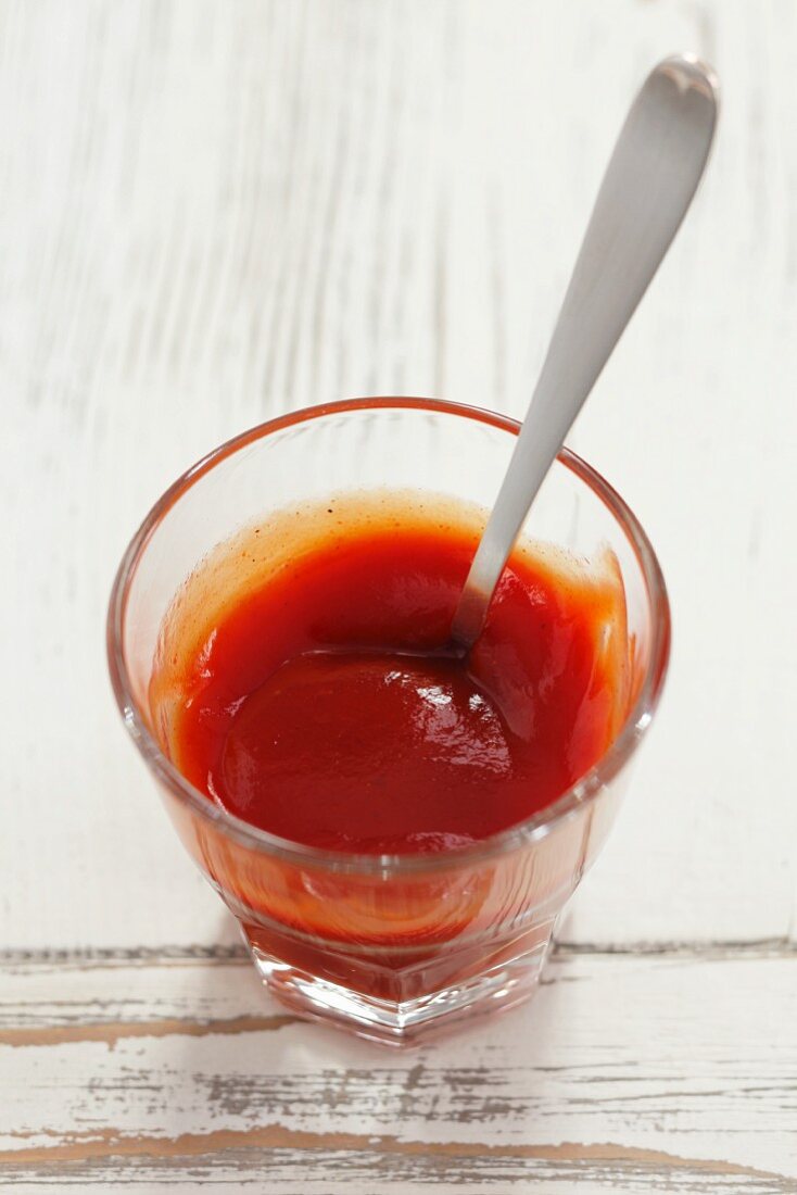 A glass of tomato ketchup