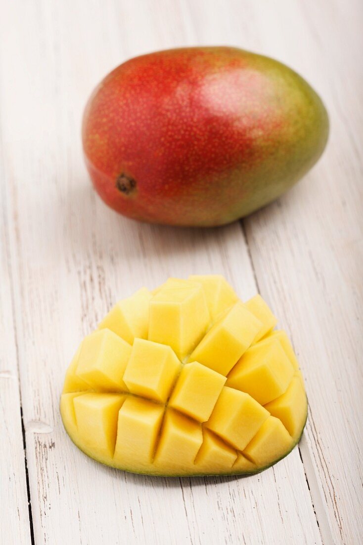 Mangos, whole and cut into cubes