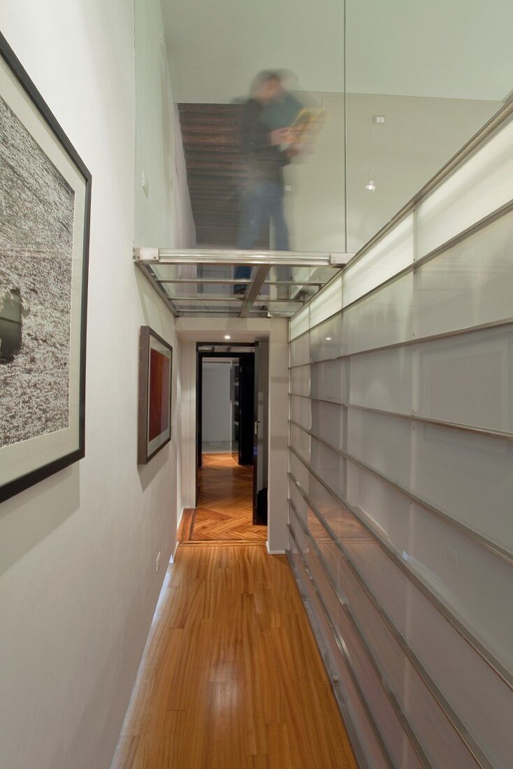 Corridor with glass and steel partition