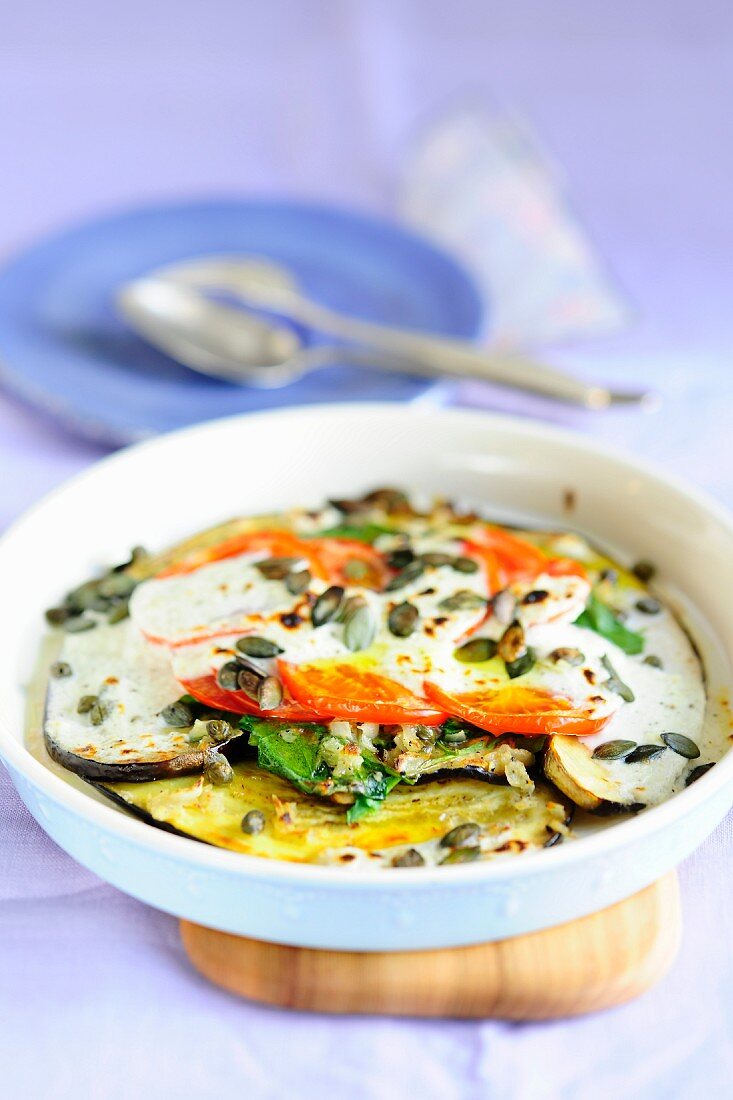 Gratinated aubergines with pumpkin seeds