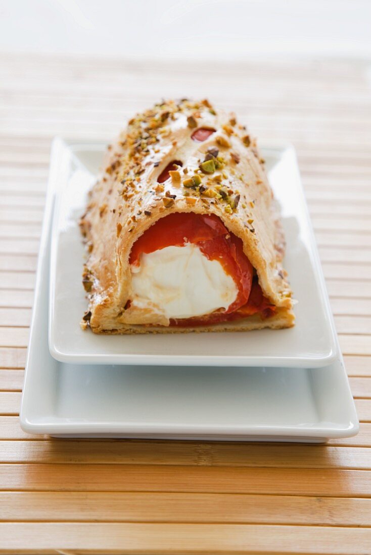 A red pepper filled with goat's cream cheese wrapped in pastry