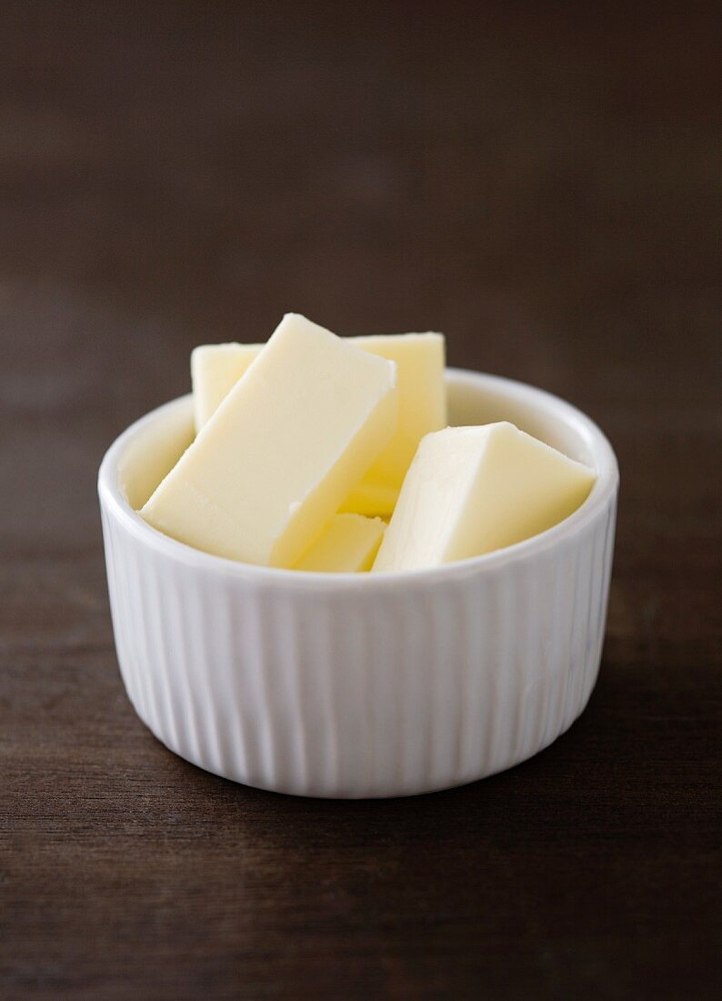 Pieces of butter in a small bowl