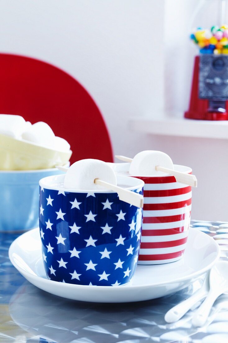 Cocoa with marashmallows in stars and stripes mugs