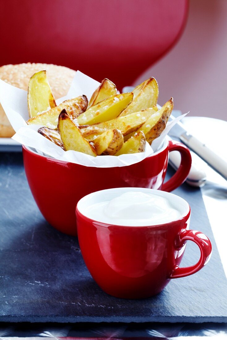 Baked potato wedges and sour cream