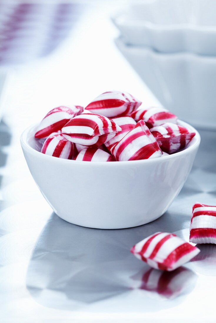Peppermint bonbons in a white bowl