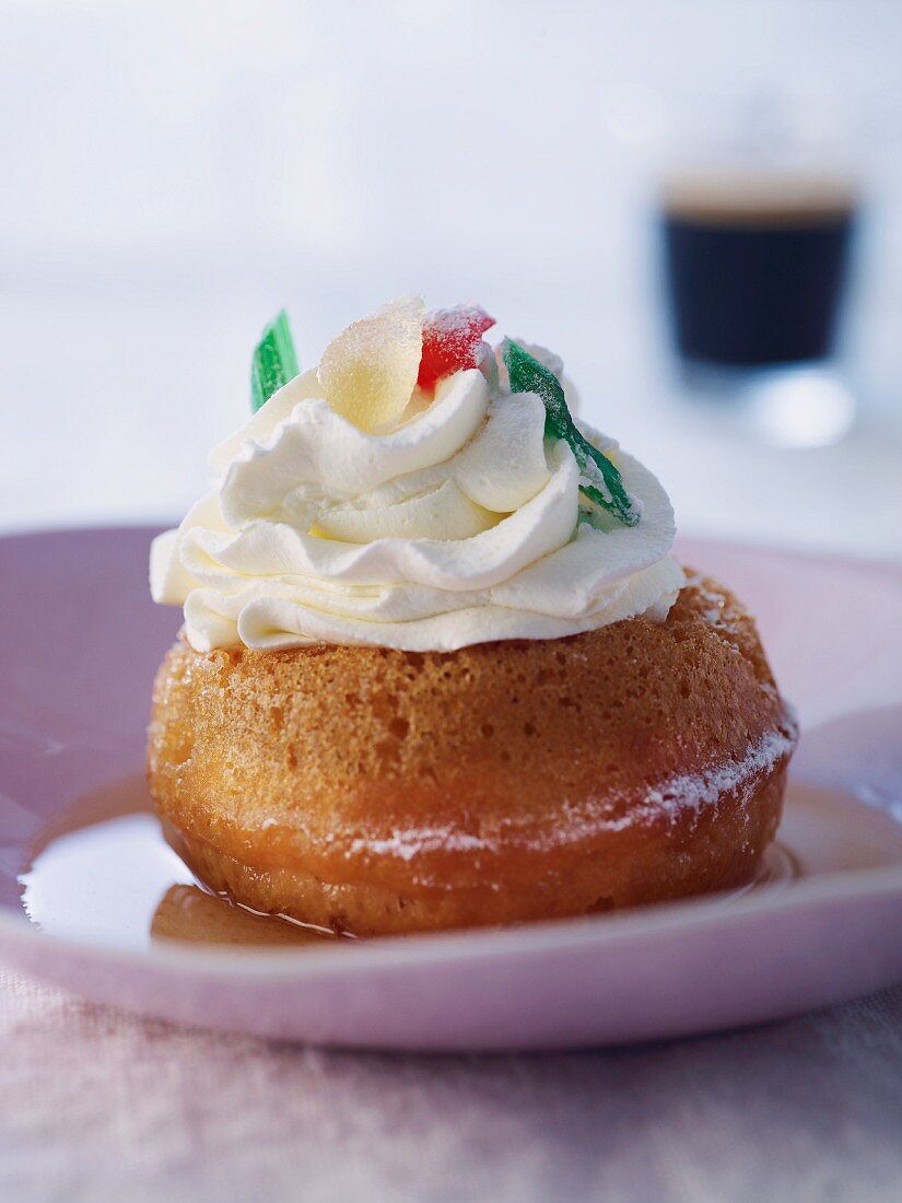 Baba au rhum (yeast cake drenched in rum)