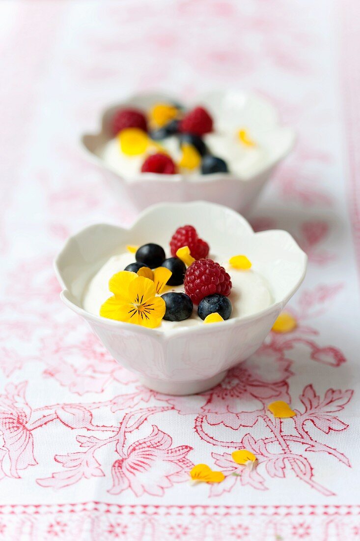Berry cream with viola flowers