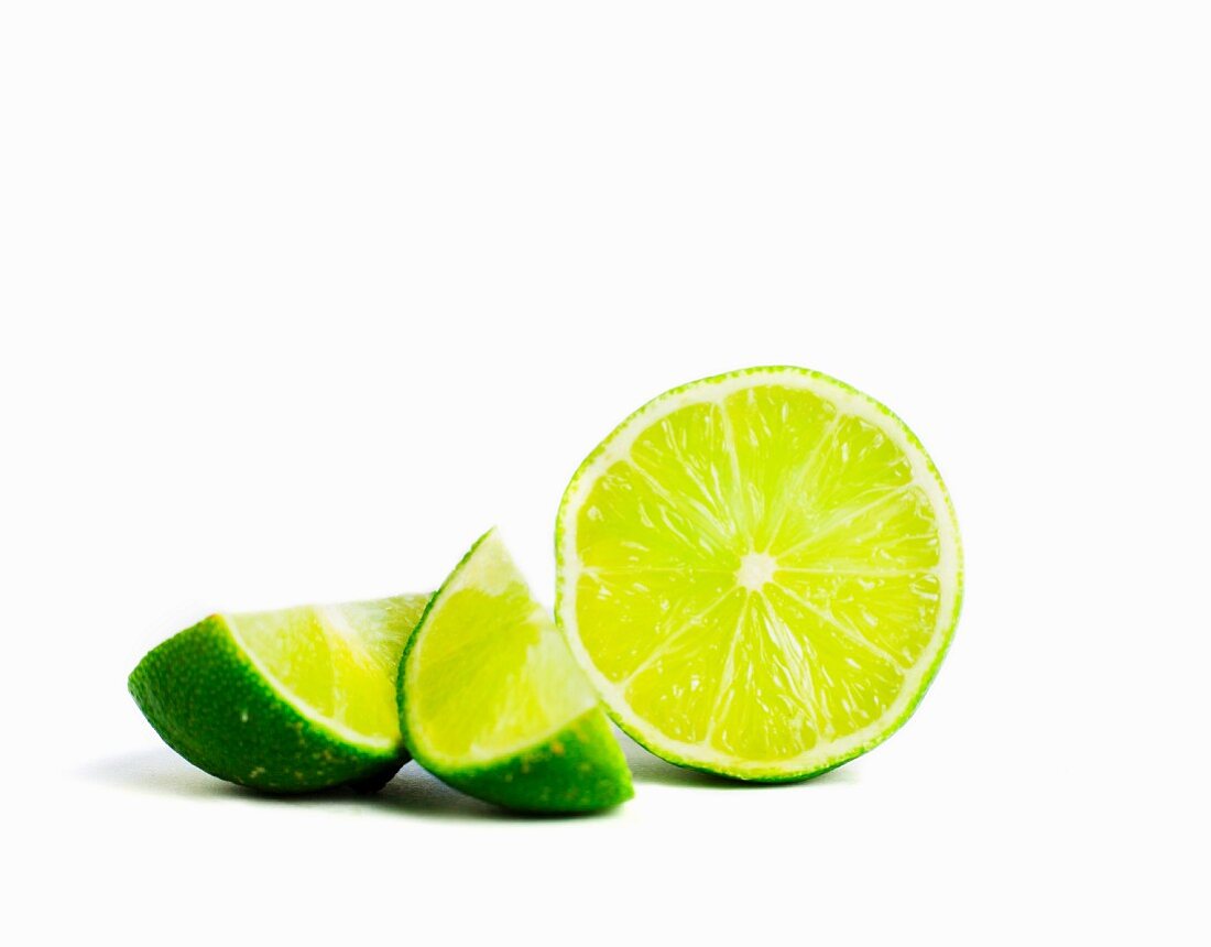 Half a lime and lime wedges