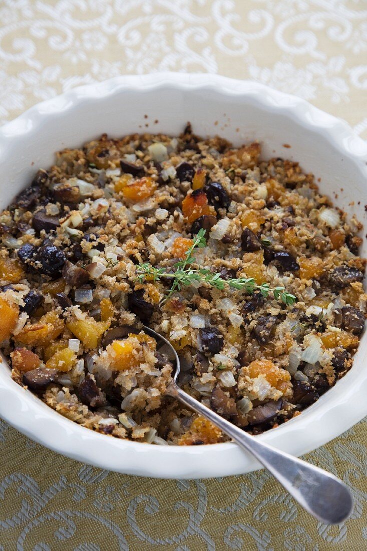 A Bowl of Chestnut Stuffing with a Spoon