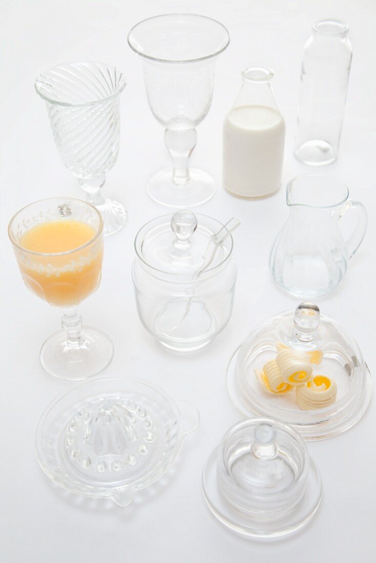 Various types of glass tableware (lemon press, cheese dome, butter dish, etc)