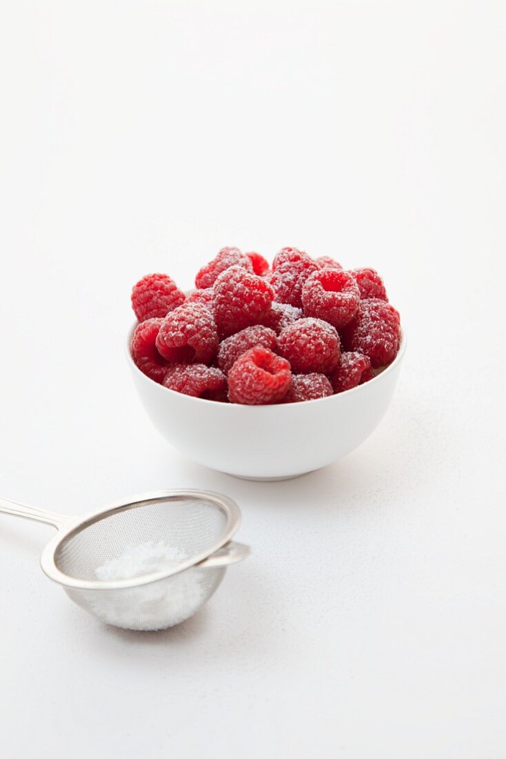 Fresh raspberries with icing sugar