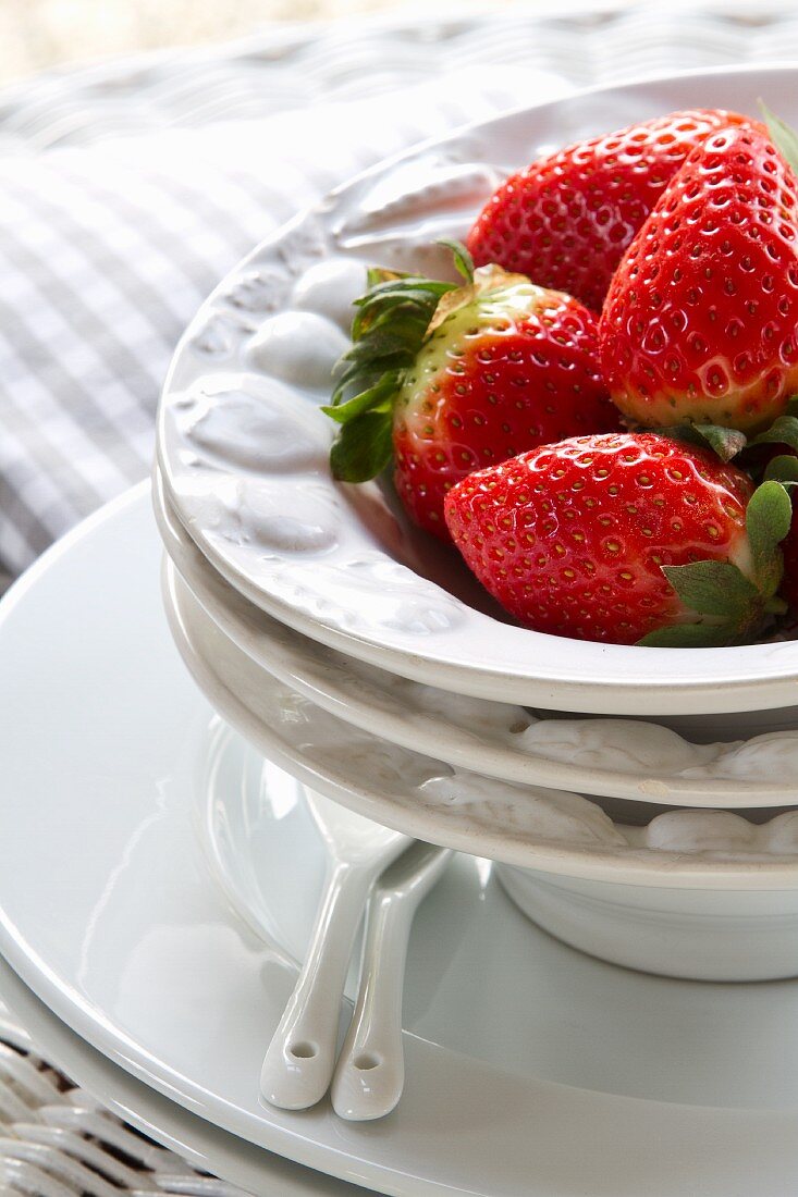 Fresh strawberries on white plate