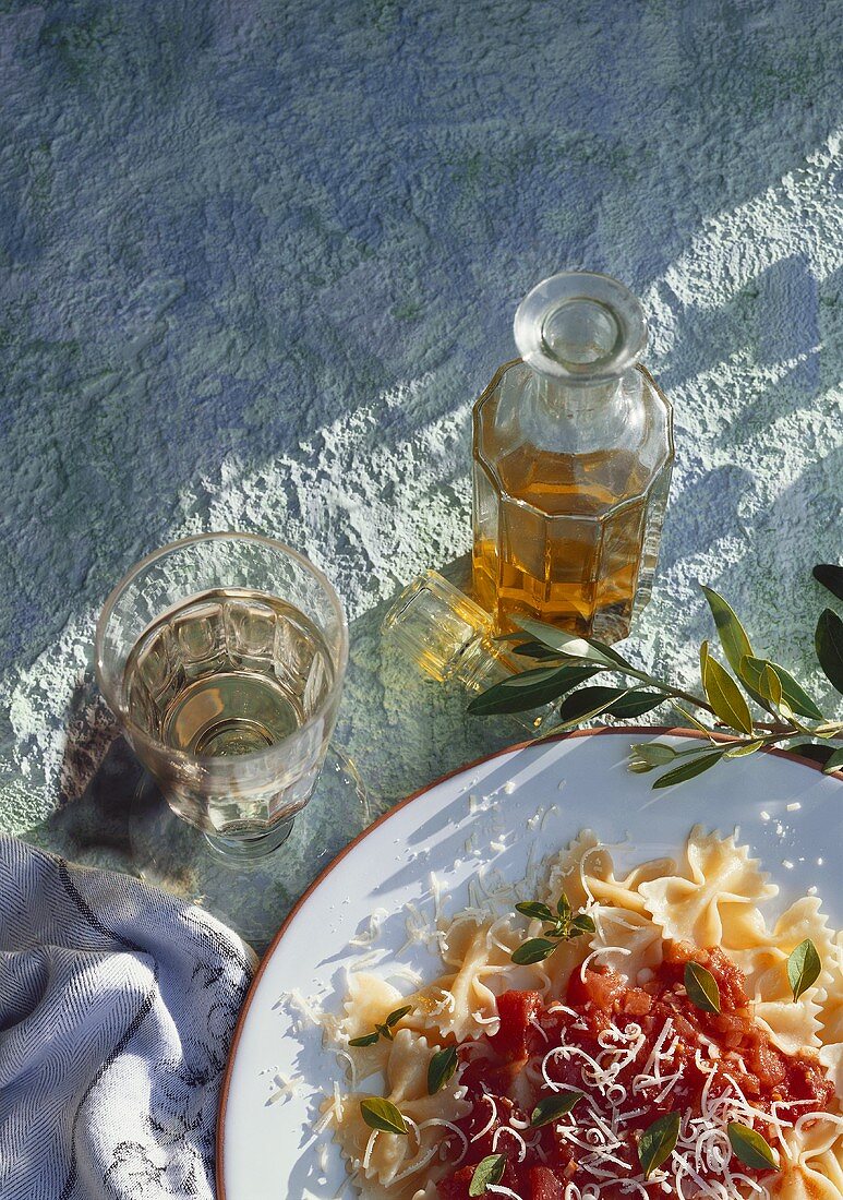 Farfalle with tomato sauce, Parmesan and sage leaves