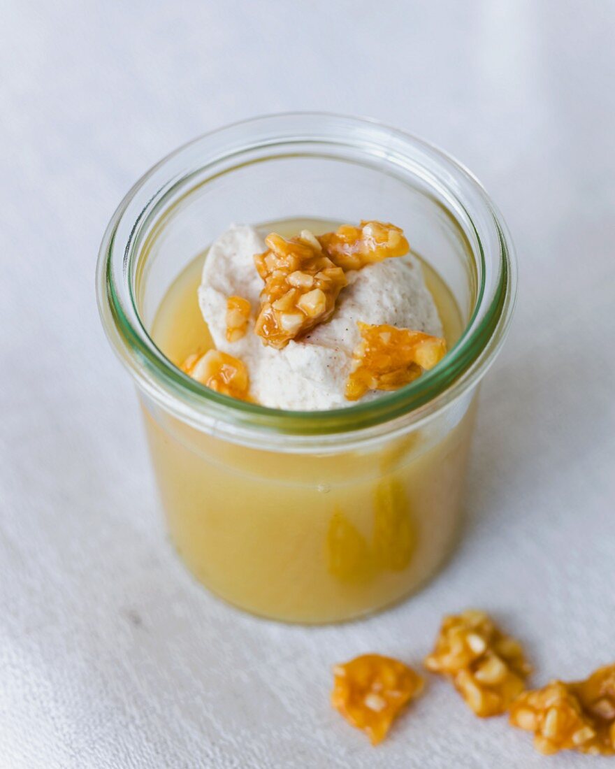 A stewed apple dessert with almond brittle