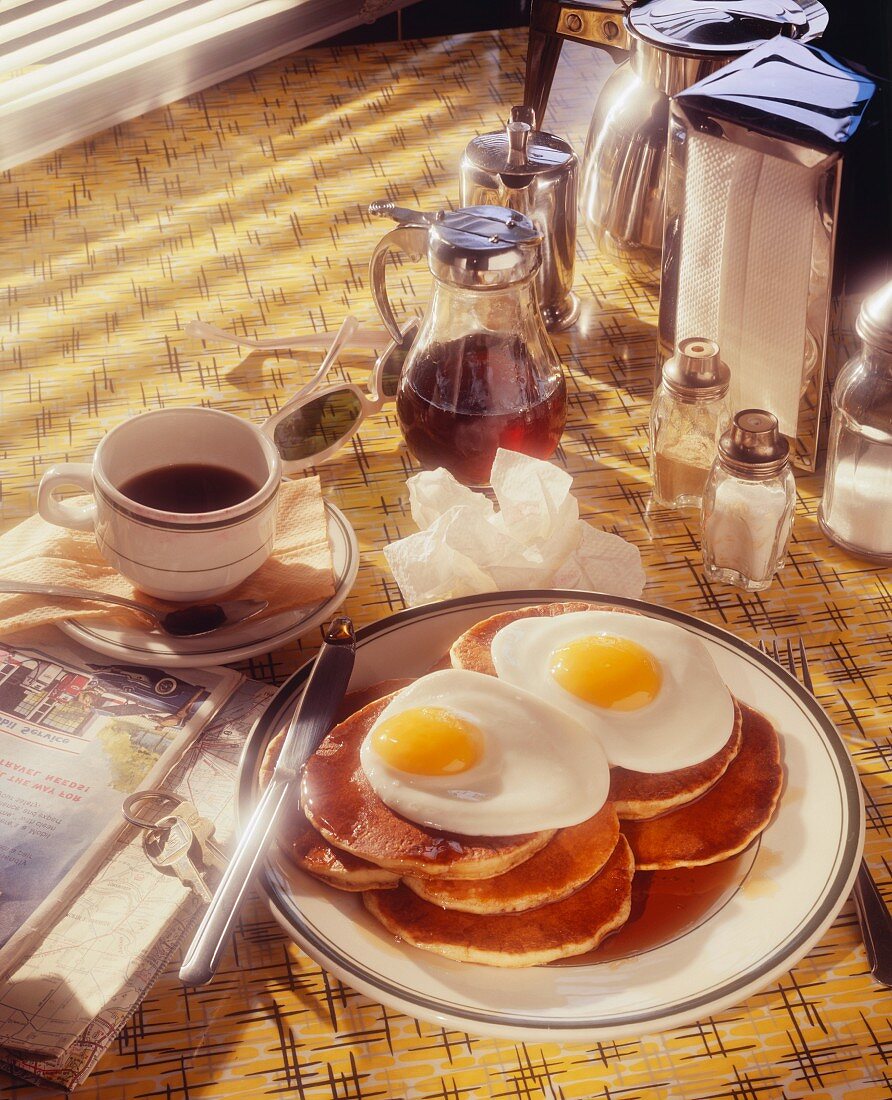 Diner Breakfast of Pancakes, Fried Eggs and Coffee