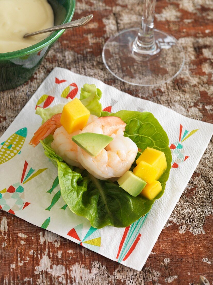 Prawns with avocado and melon wrapped in lettuce leaves