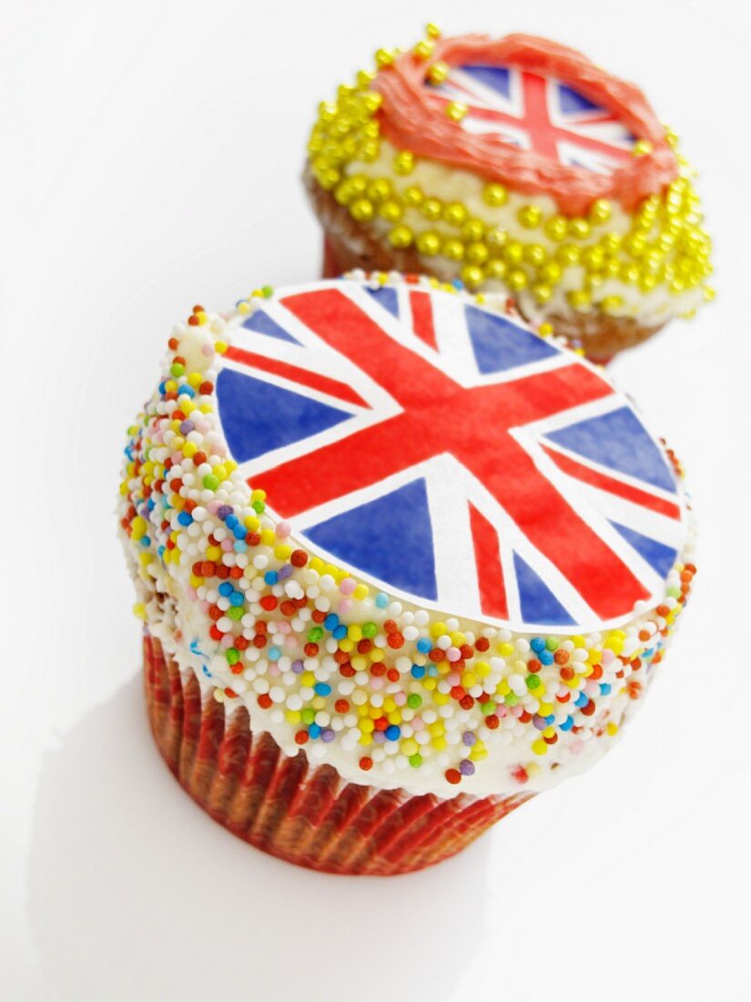 Two cupcakes decorated with Union Jacks